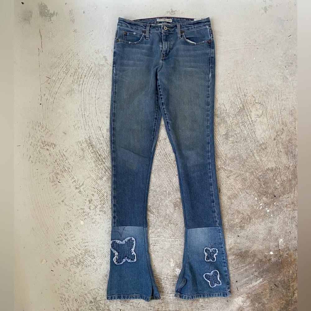 Upcycled stacked jeans with butterfly details
